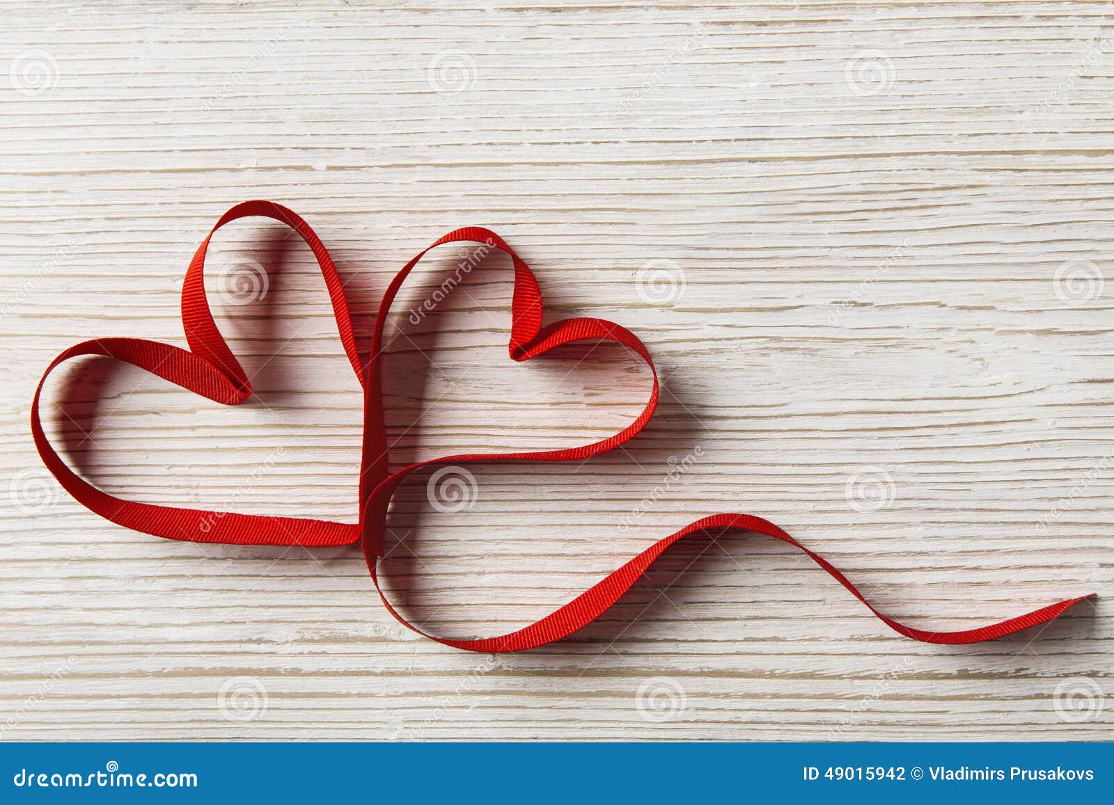 two hearts on wooden background. valentine day, wedding love concept