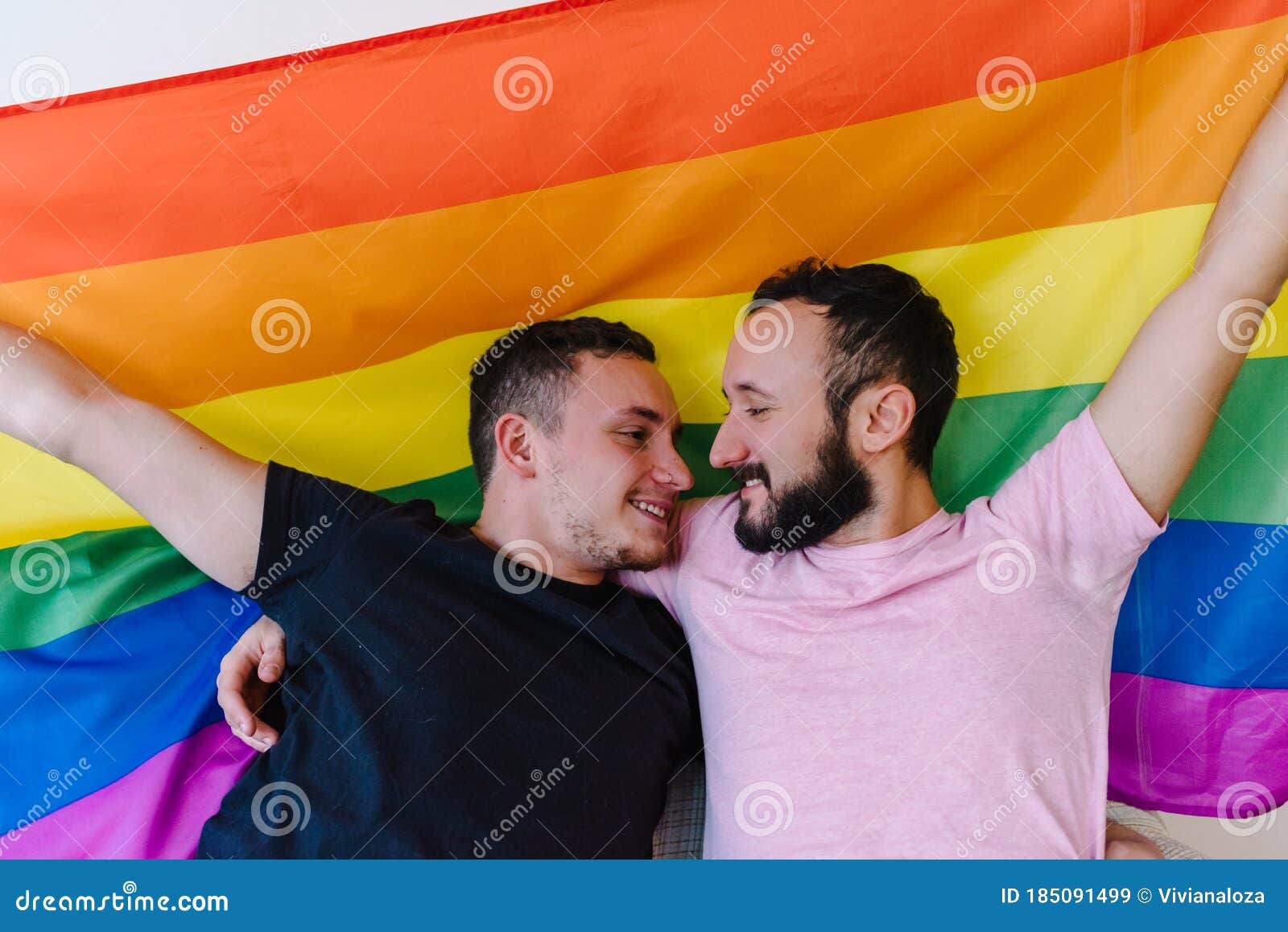 Two Homosexual Men Holding LGBTQ Flag Stock Image - Image of loving
