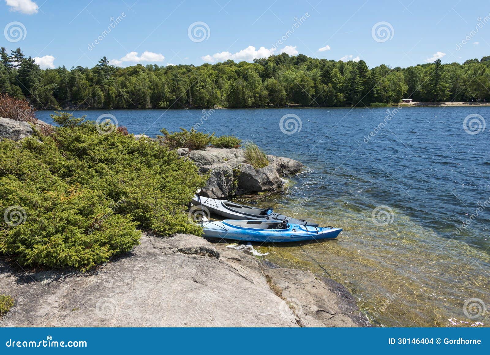 Two Kayaks on an Island stock photo. Image of park, wave 30146404