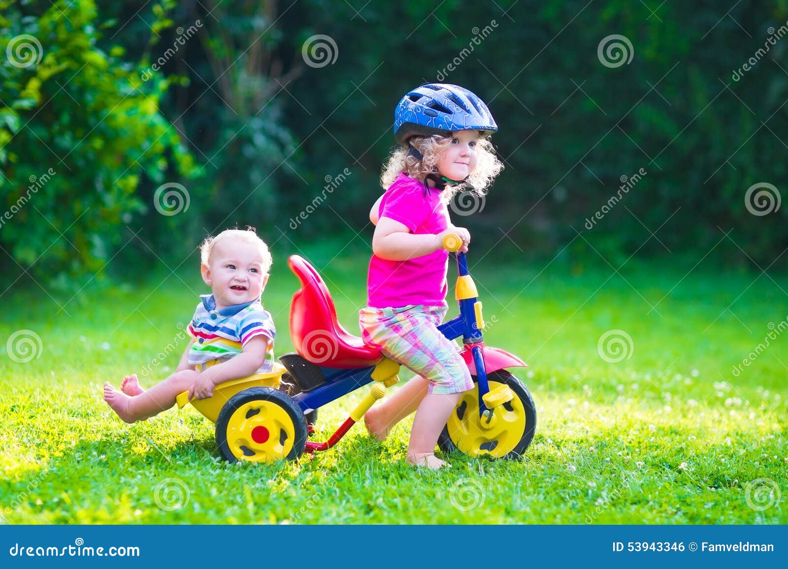 two kids on a bike
