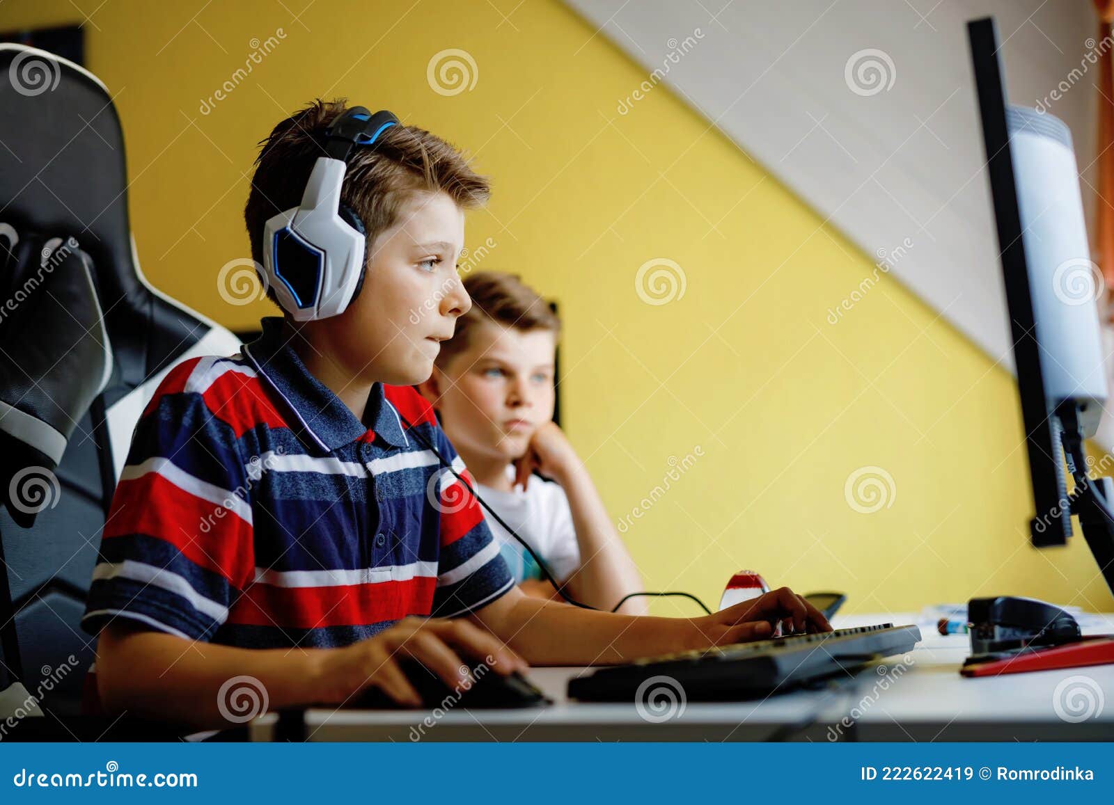 Boy play game on gaming PC online Stock Photo - Alamy