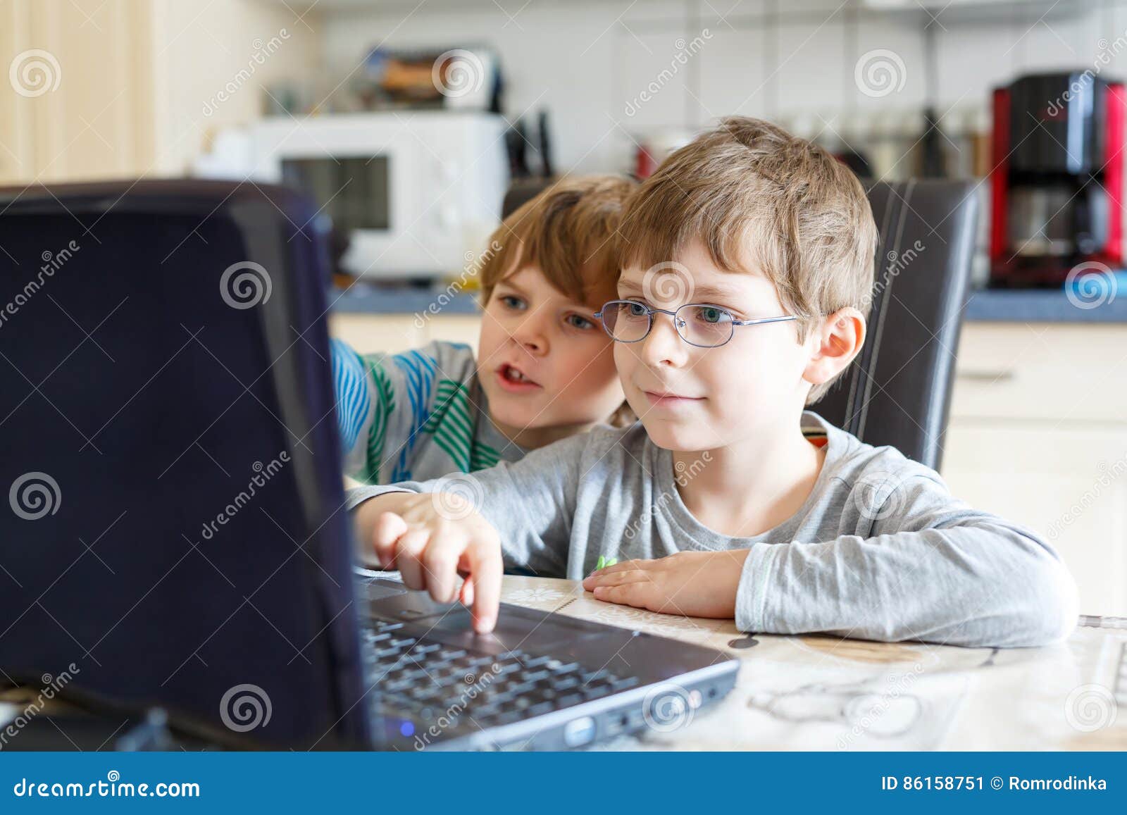 Two Kids Boys Playing Online And Surfing In Internet On Computer Stock Image - Image ...1300 x 957