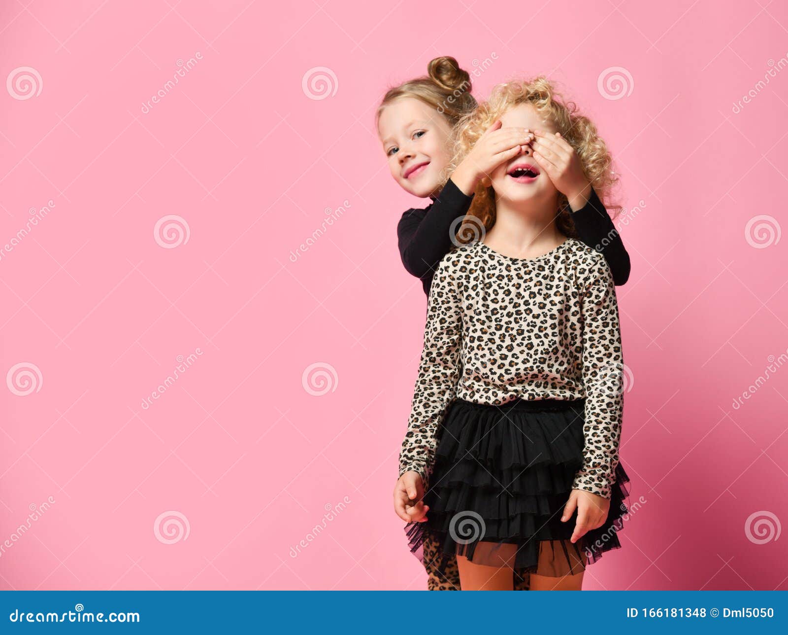 Two Kids Girls Friends Sisters in Leopard Print Clothes Pants and Shirt are  Playing Guess Who Game Stock Photo - Image of freedom, friendship: 166181348