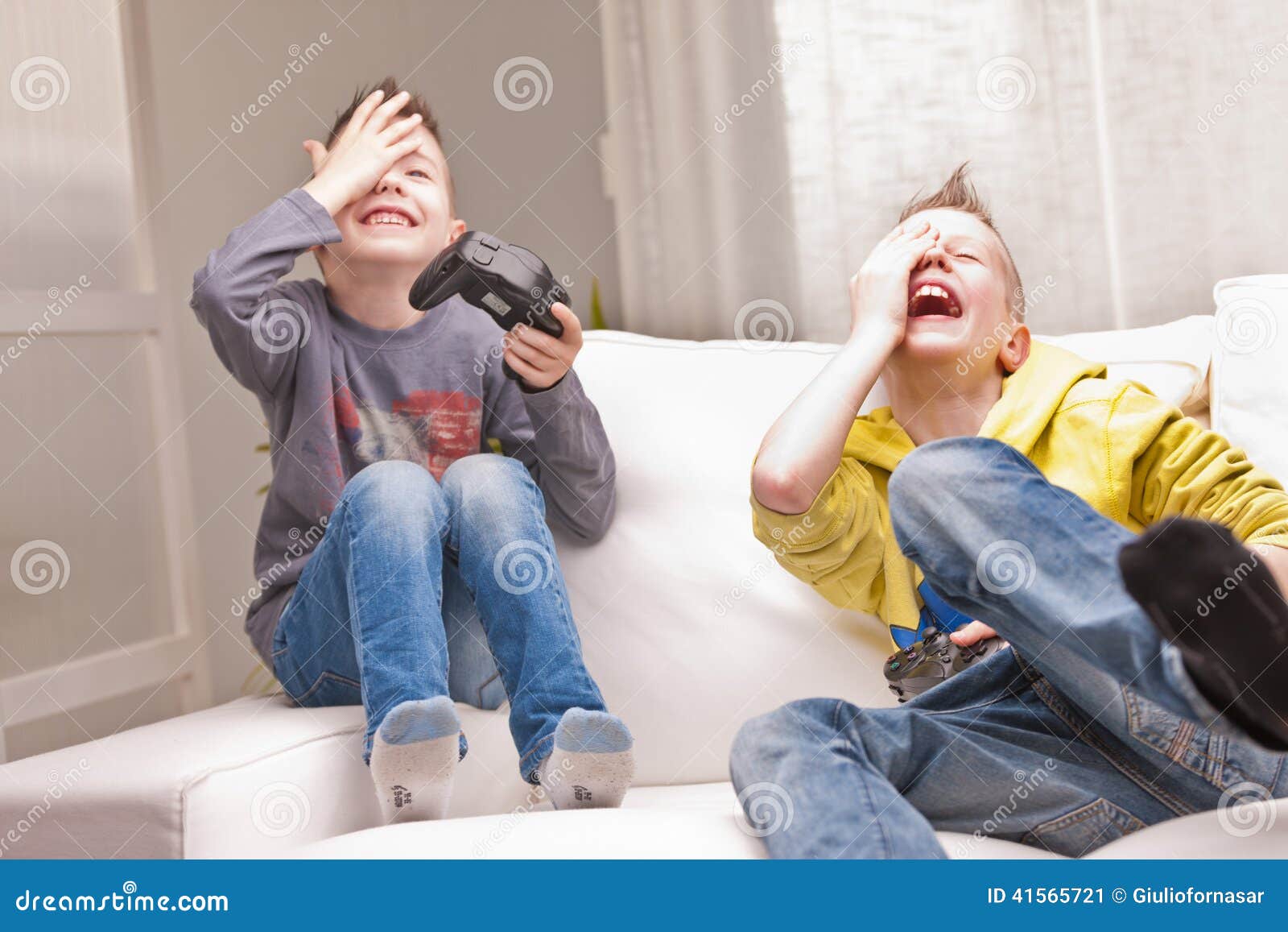 186 Sitting On Ground Playing Video Games Stock Photos, High-Res