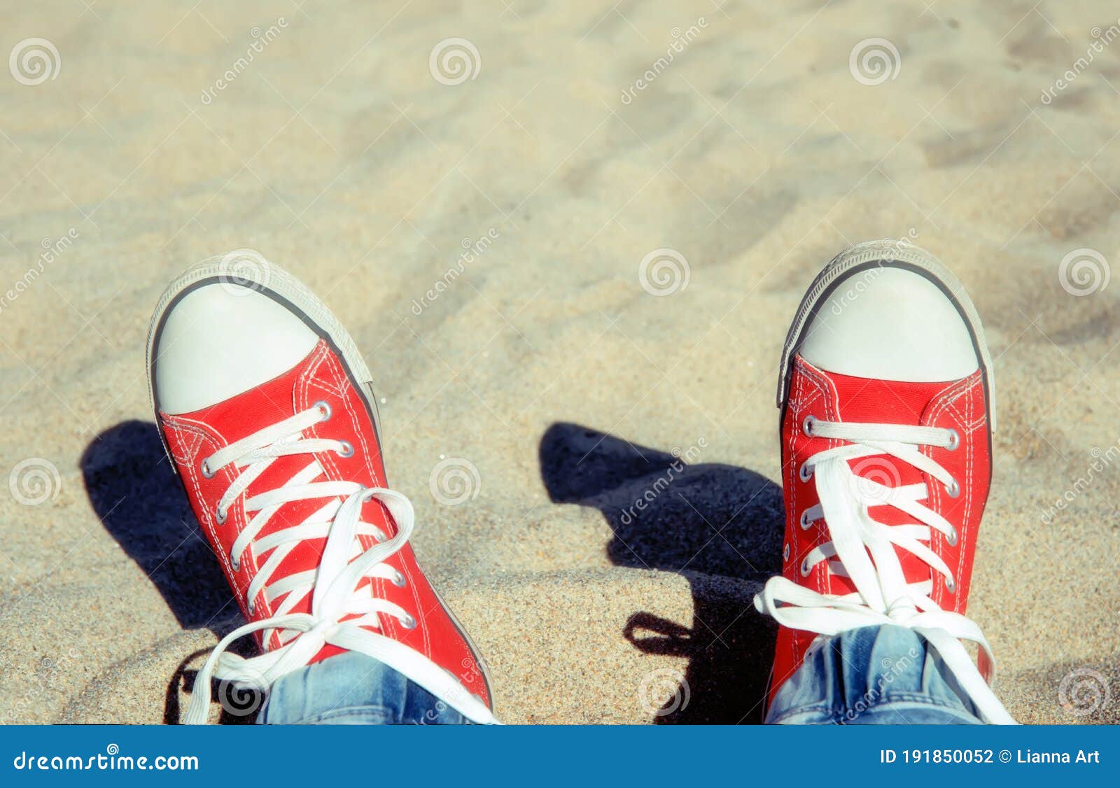 Two Legs in a Red Gym-shoes with White Laces Stock Photo - Image of ...