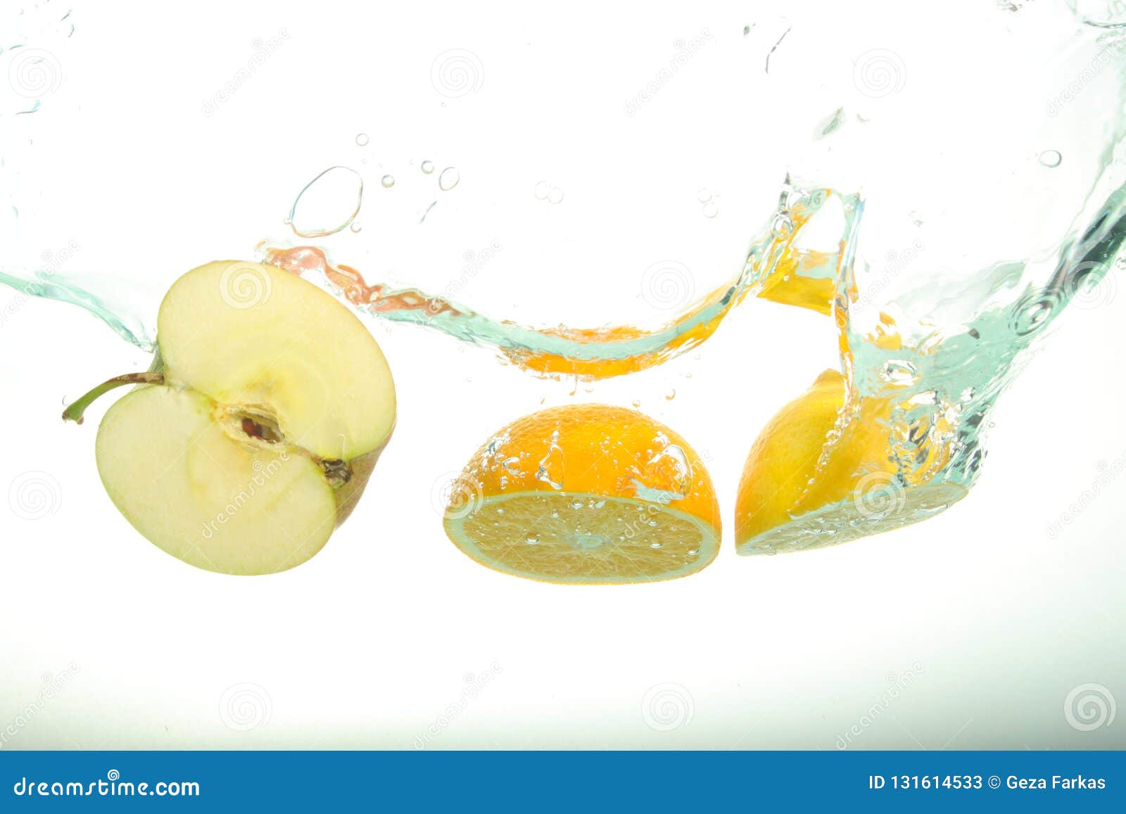 Two Lemon And Apple Slices Splash Of Water On White Background Stock Image Image Of Fruits Shiny 131614533