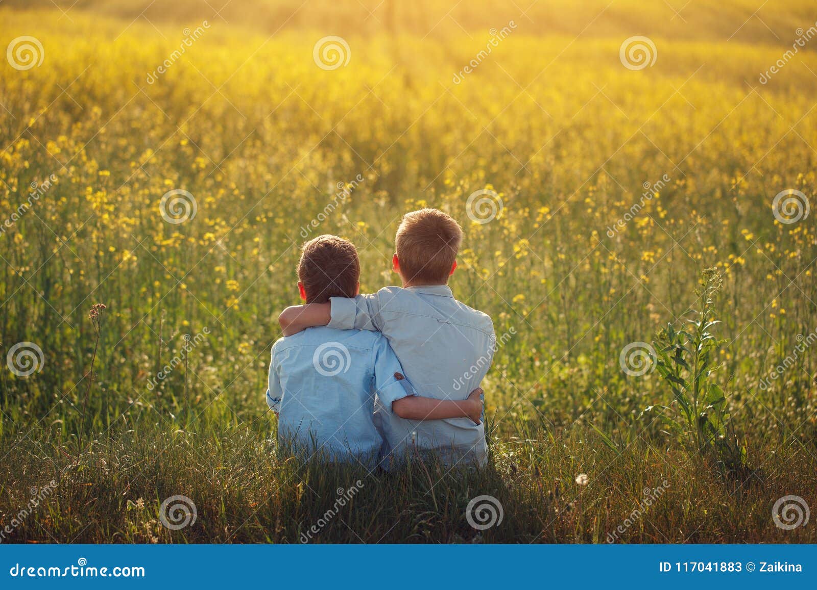 Two Little Boys Friends Holding Around the Shoulders in Sunny ...