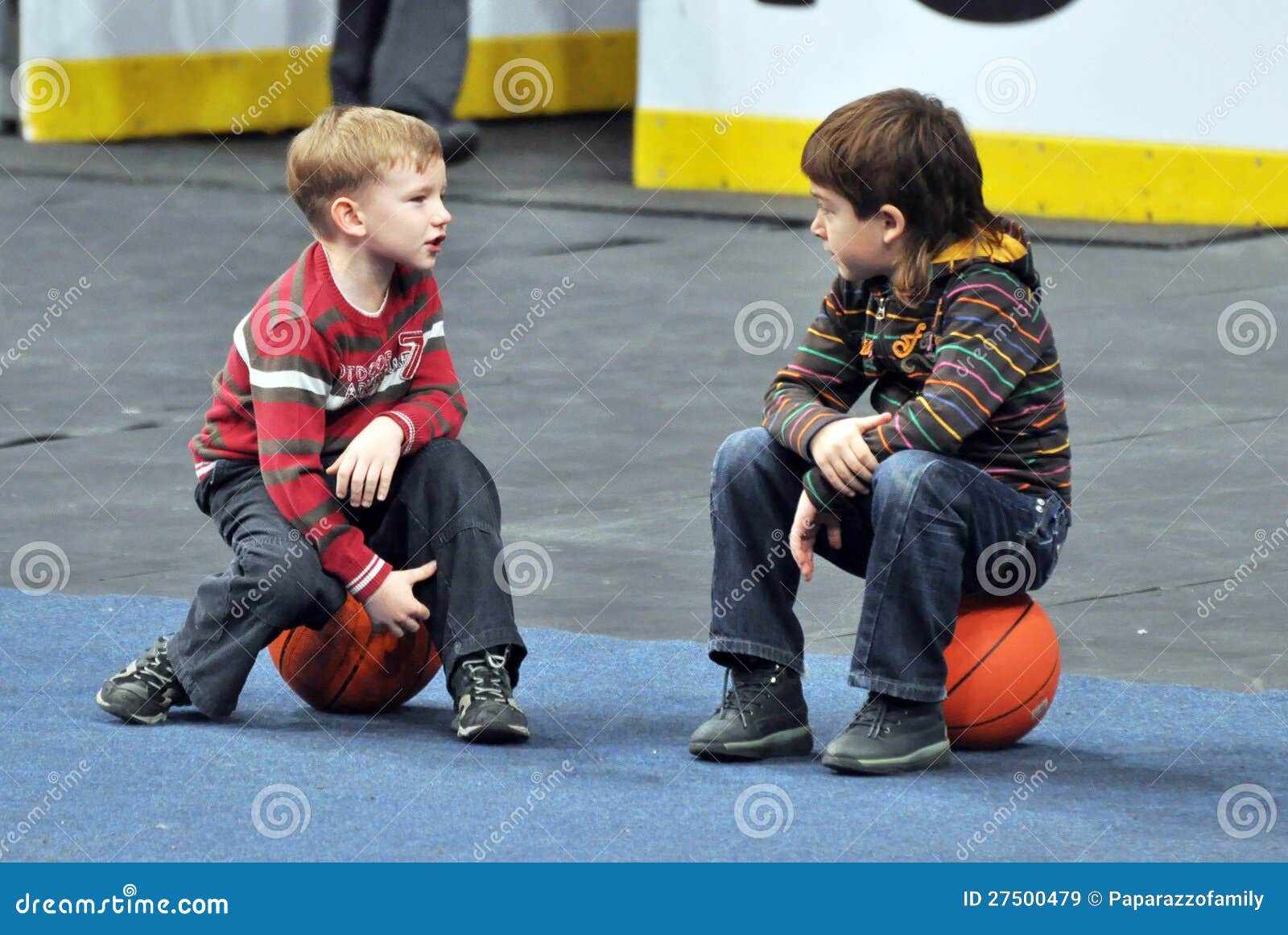 Two Little Boys Are Sitting On The Balls Editorial Stock Image Image