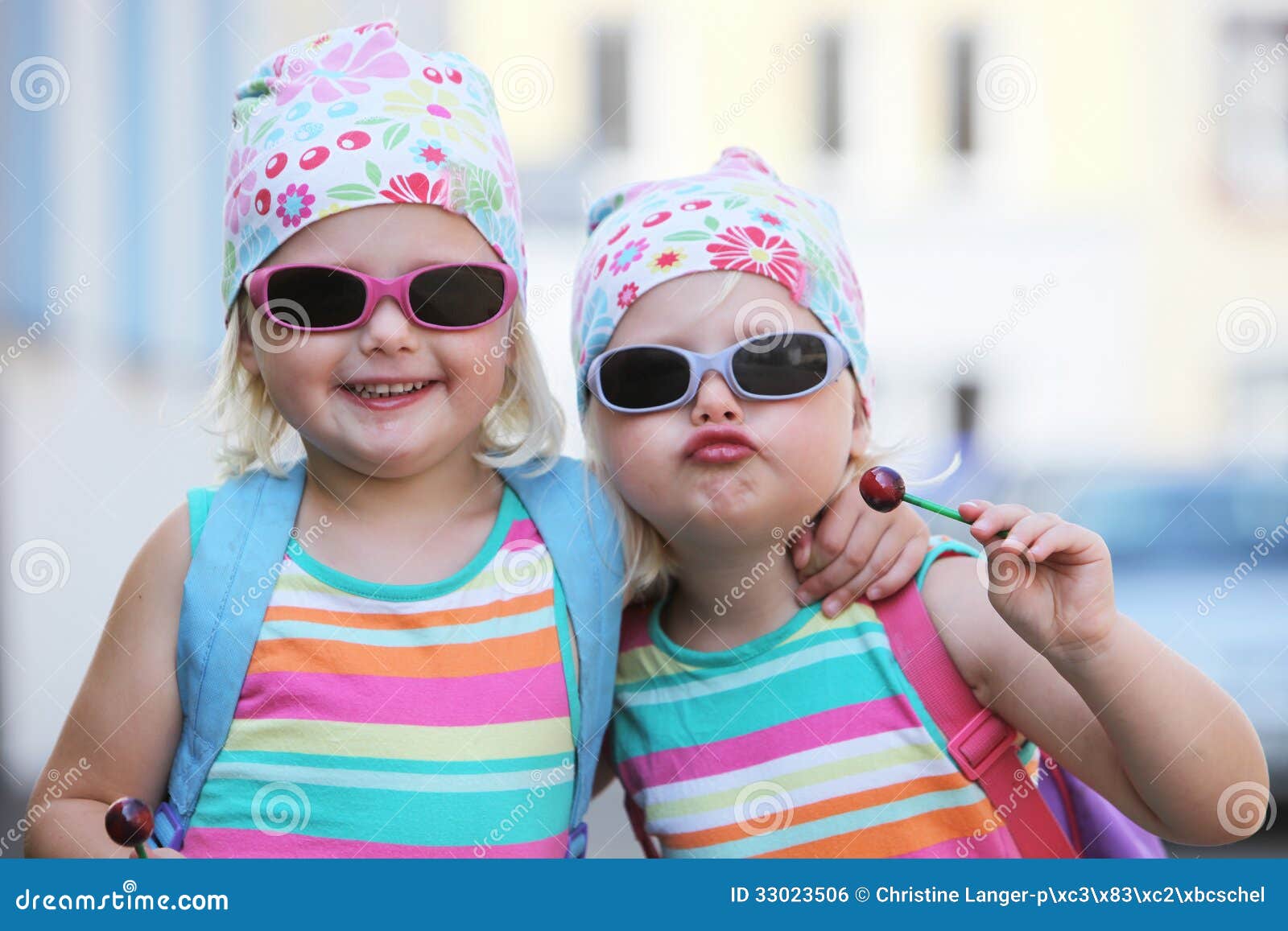 Two Little Identical Twins In Sunglasses Stock Photo 