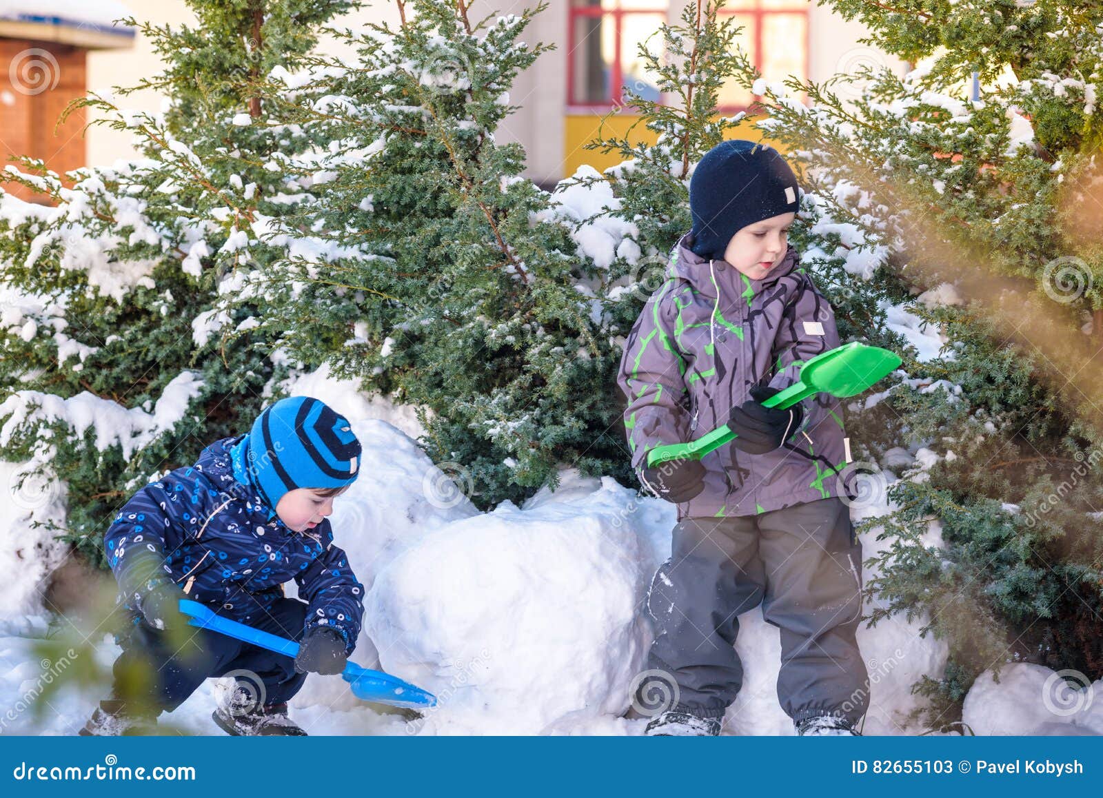 Two Little Kid Boys in Colorful Clothes Playing Outdoors during ...