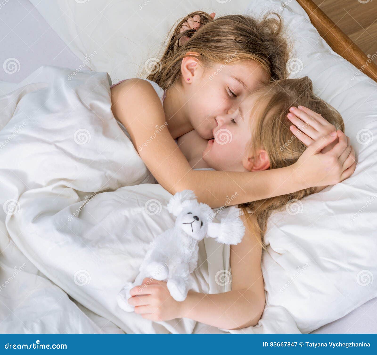 Two Little Sisters Hugging In Bed Stock Image Image Of Pleasure Girl 83667847 