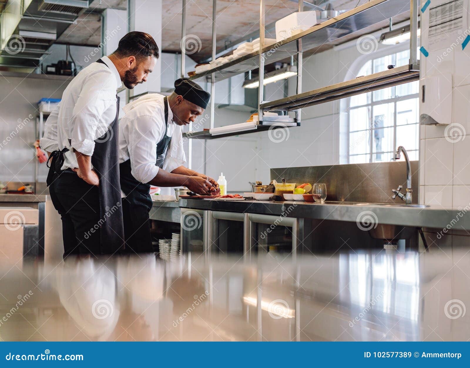 Chefs Cooking Food In Commercial Kitchen Stock Image Image Of