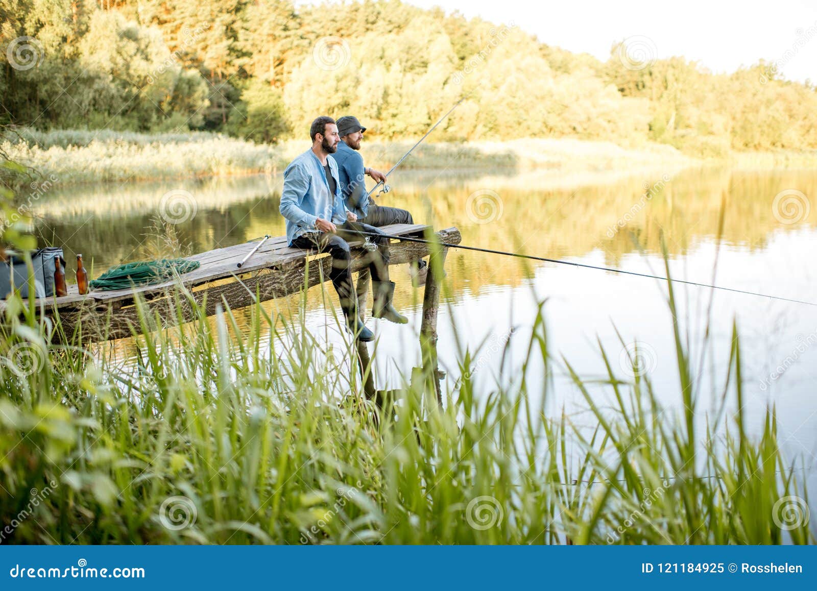 Two Men Fishing on the Lake Stock Image - Image of caucasian