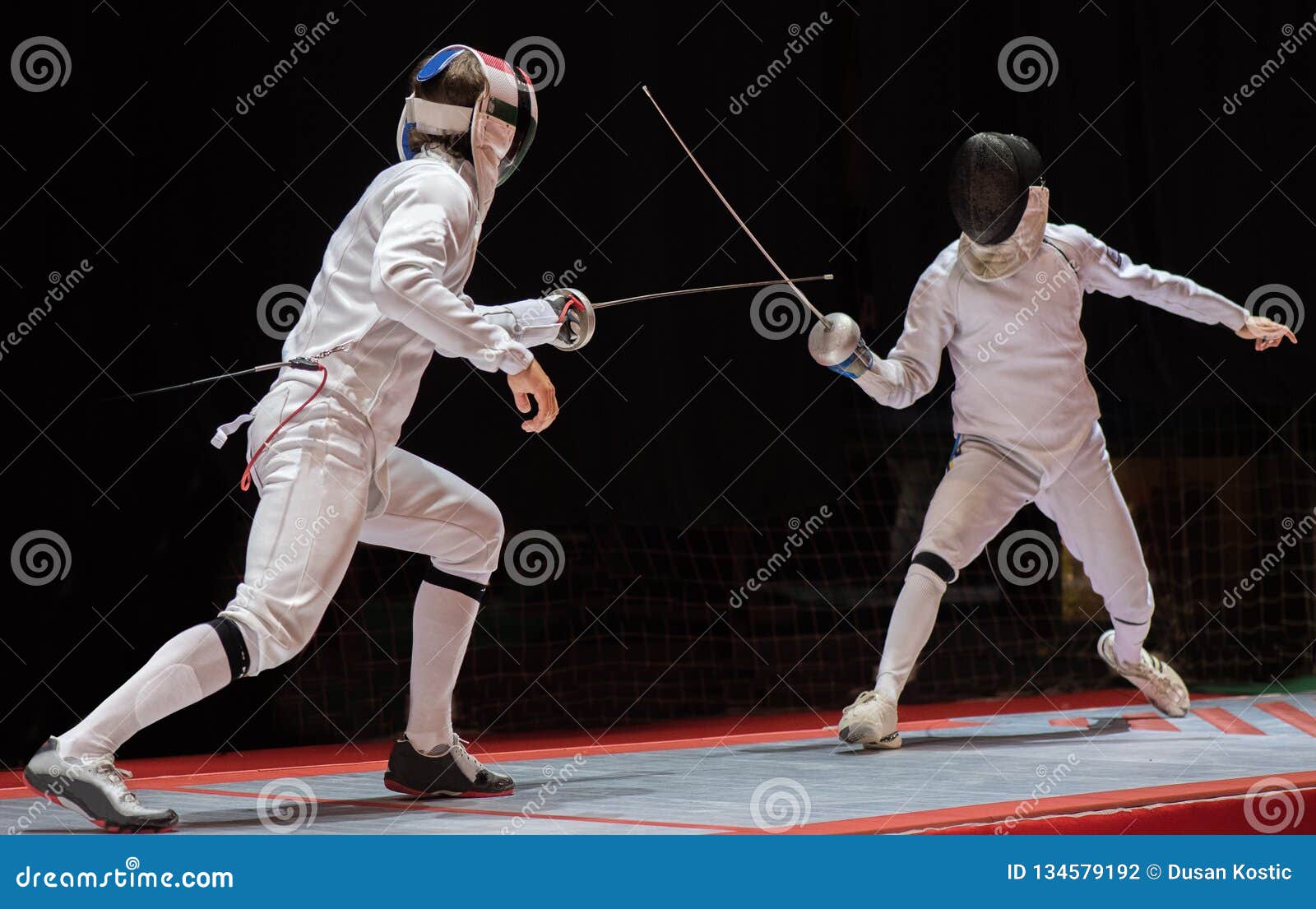 two man fencing athletes fight