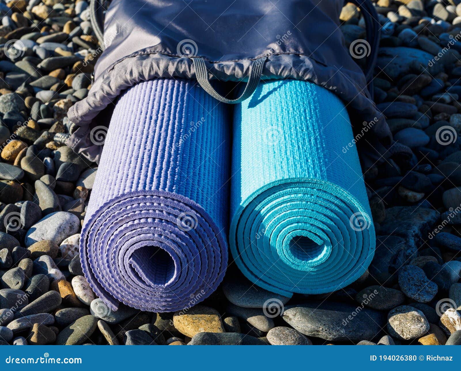 Two Mats for Yoga or Pilates in a Case on the Beach Stock Photo Image