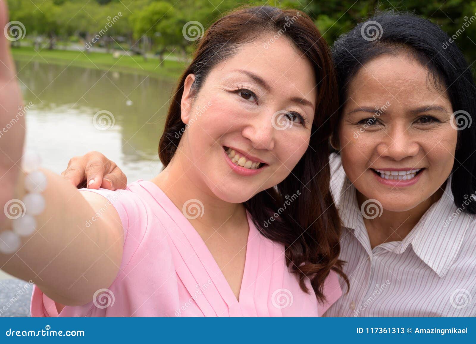 Two Mature Asian Women Together Relaxing At The Park Stock Image Image Of Couple Japanese