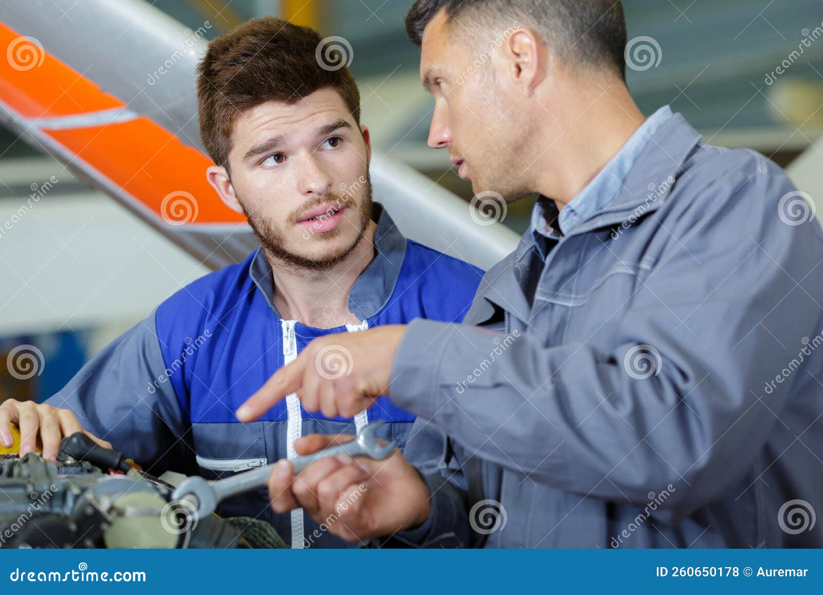 Two Mechanics Working on Airplane Stock Photo Image of motor