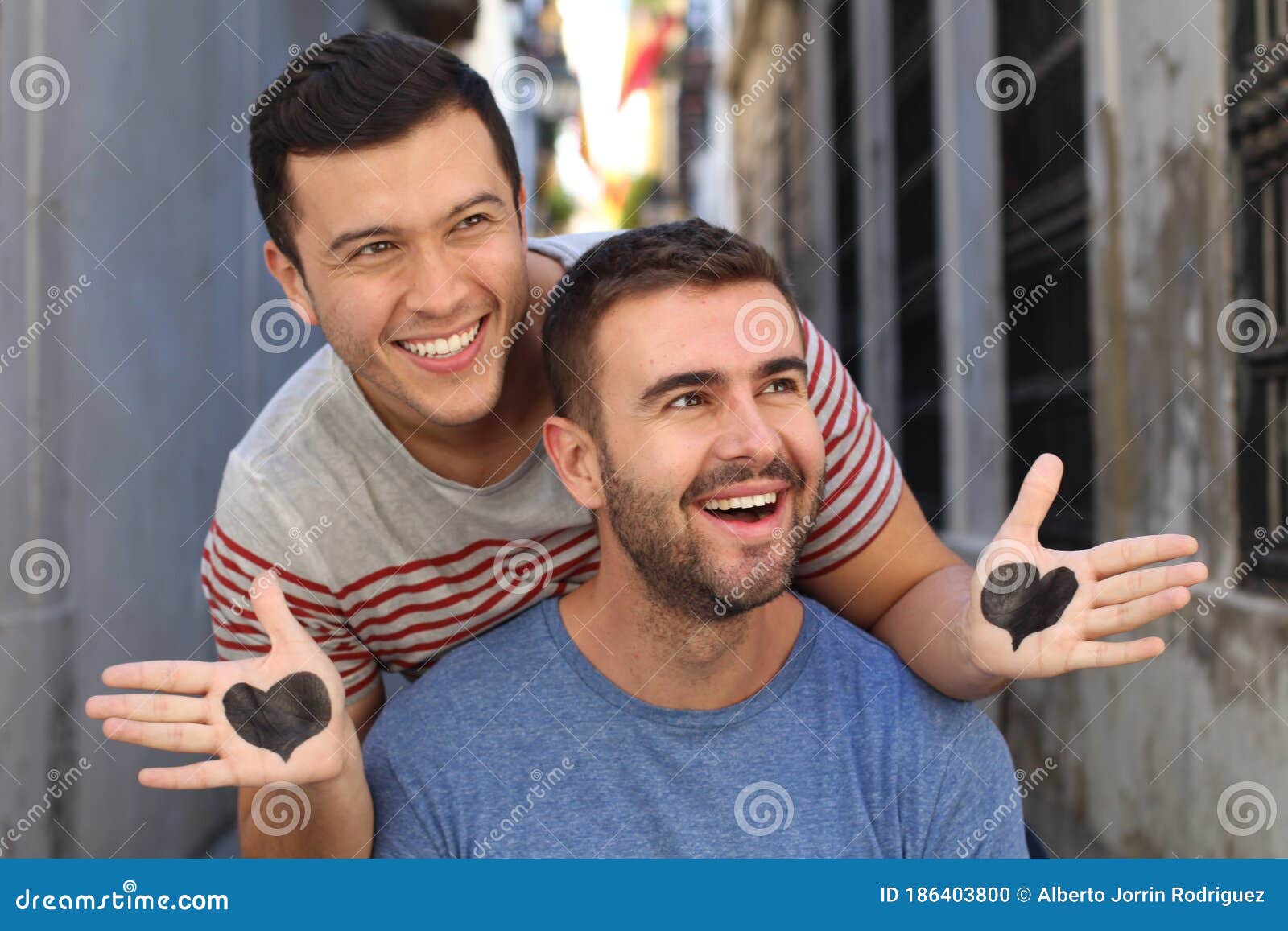 Two men falling in love stock photo. Image of holding - 186403800