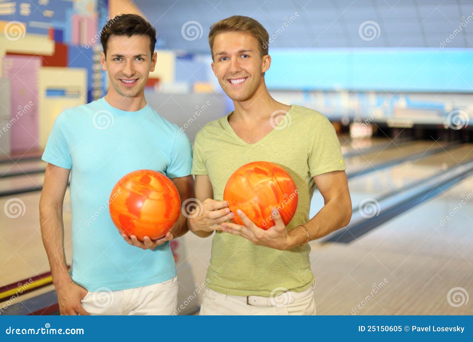Two Men Hold Balls in Bowling Club Stock Image Image of ball, pair