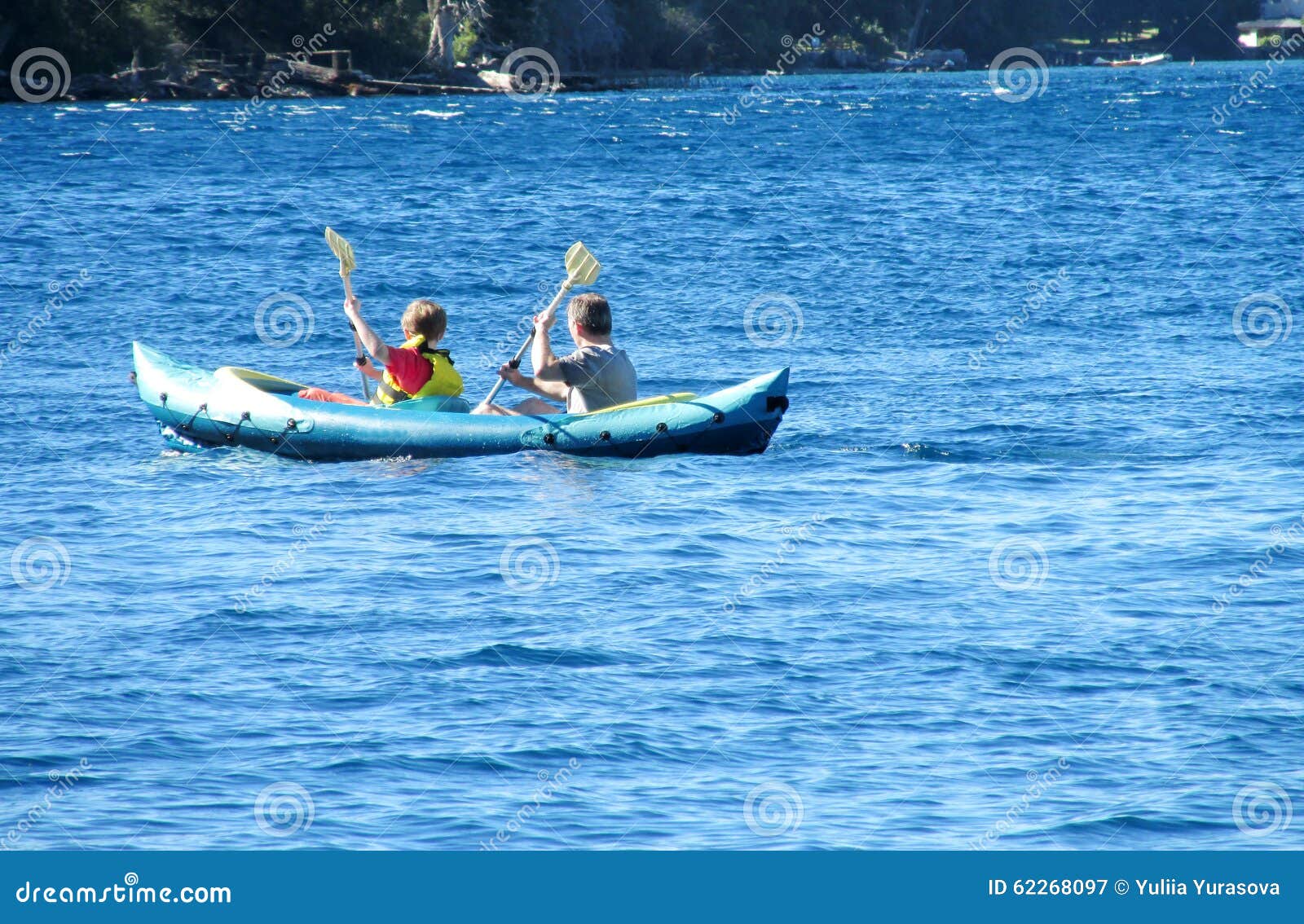 Two men in kayak editorial photography. Image of lake ...