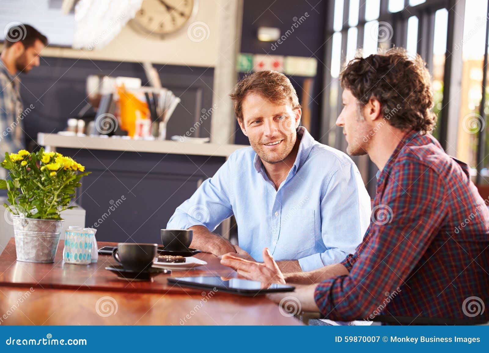 Two Men Meeting at a Coffee Shop Stock Image Image of break, happy