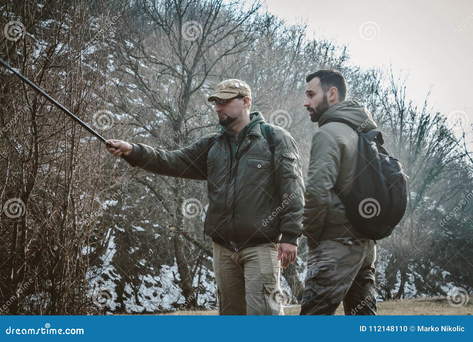 https://thumbs.dreamstime.com/z/two-men-talking-nature-carry-backpacks-fishing-rods-outdoor-activities-two-men-talking-nature-carry-backpacks-112148110.jpg