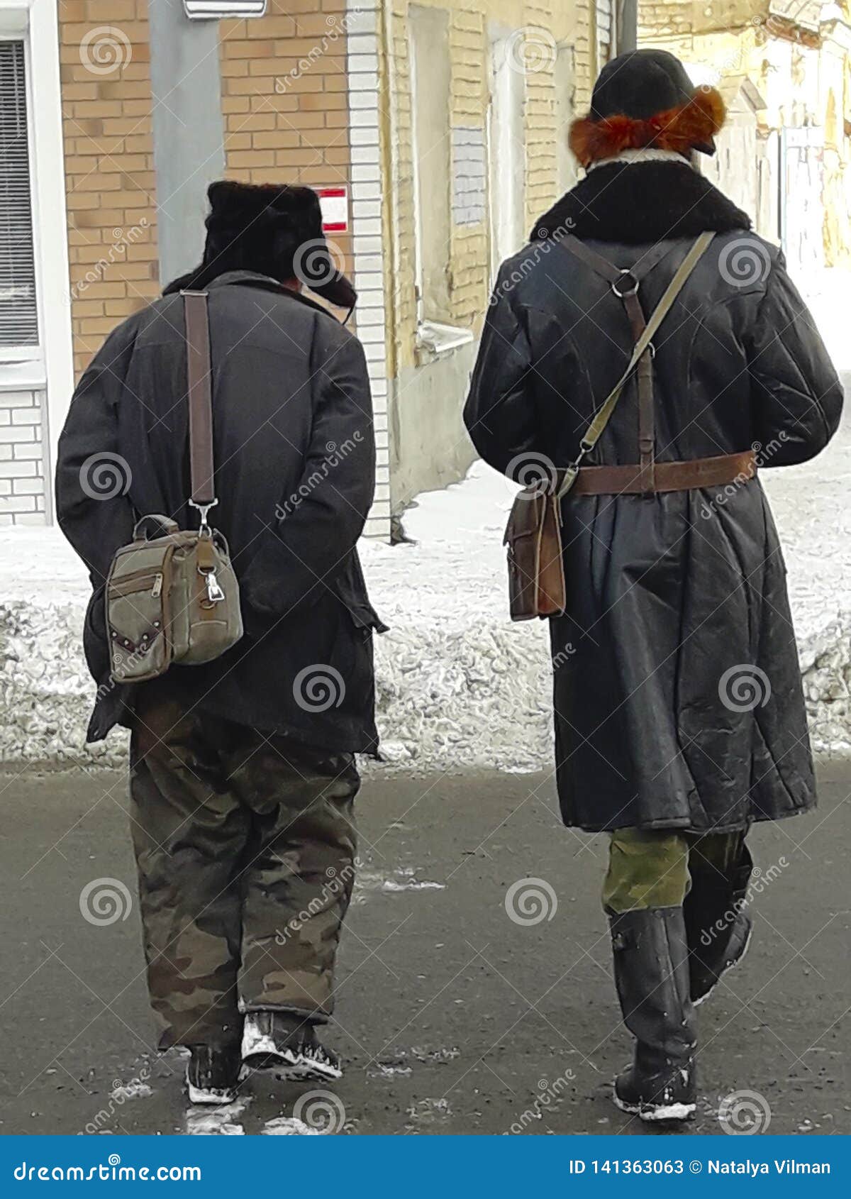 Two Men Walking Down The Street In An Old Revolutionary Clothing, Retro  Style. Winter, Russia Stock Image - Image Of Black, Casual: 141363063
