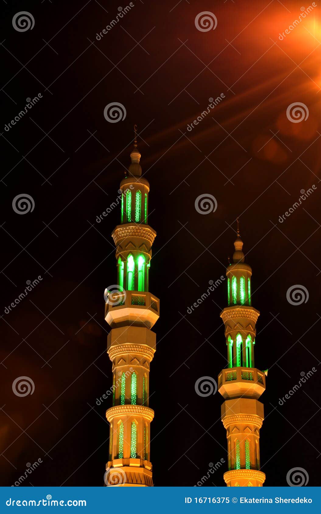 two minarets in the night in united arab emirates