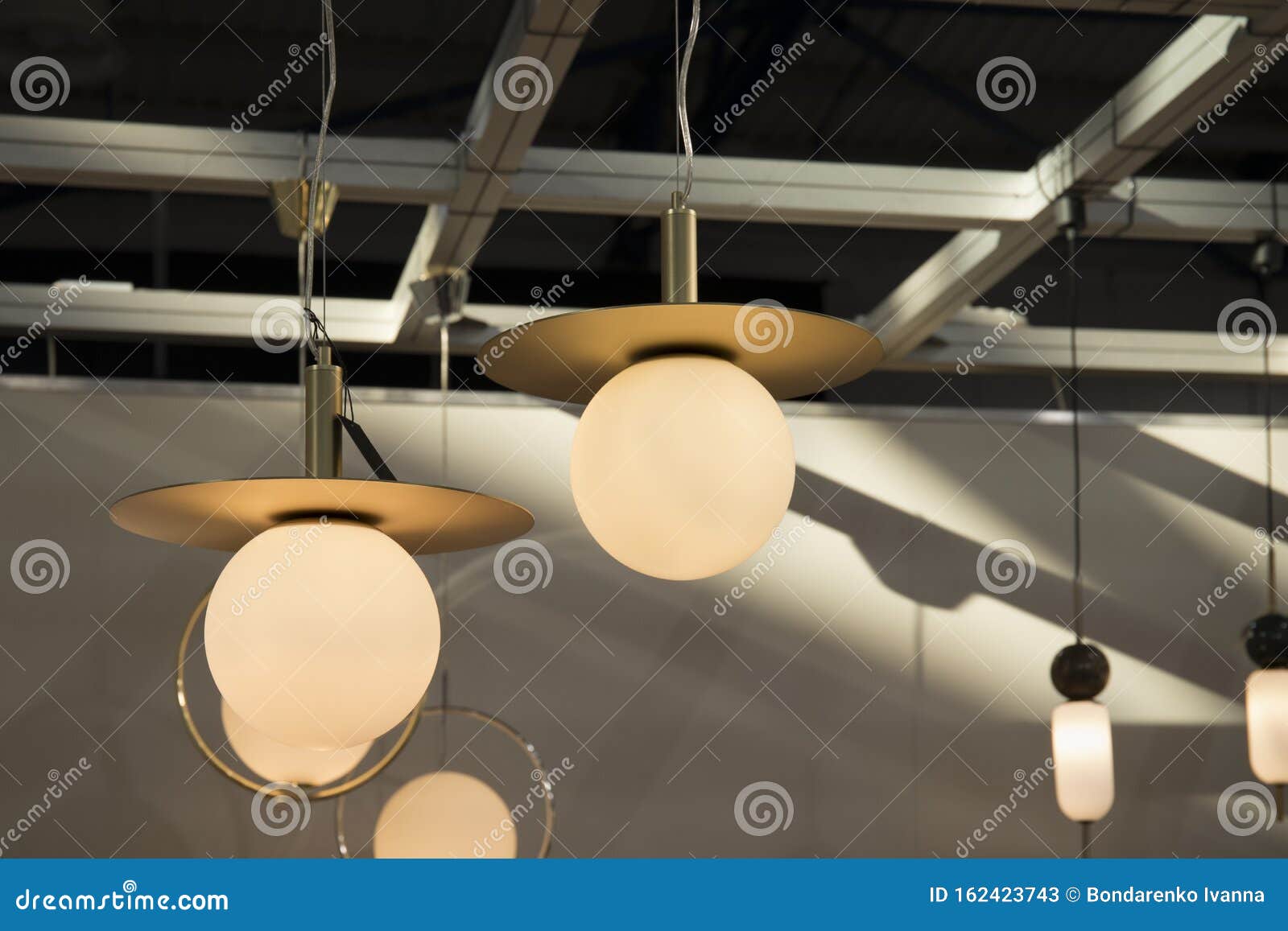 Two Modern Pendant Chandelier Light with Turn on Bulb Stock Image