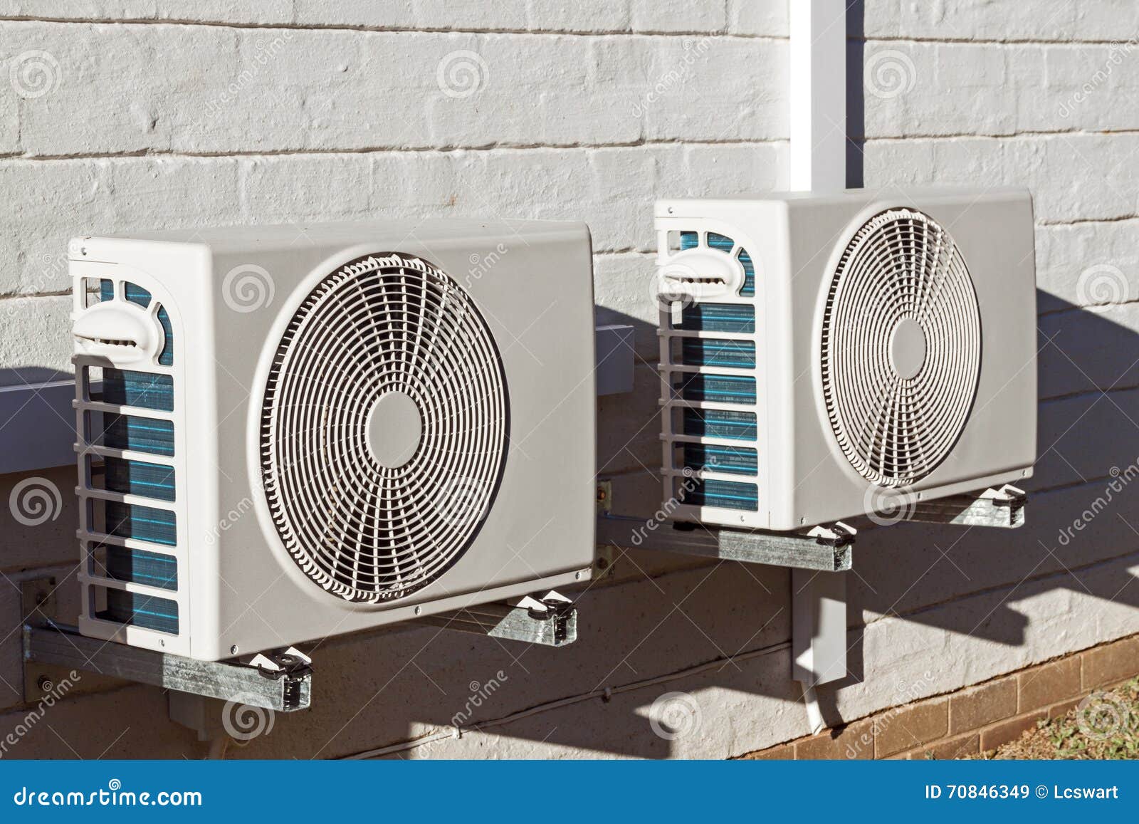 Two Newly Installed Airconditioning Units Mounted on Walll Stock Image