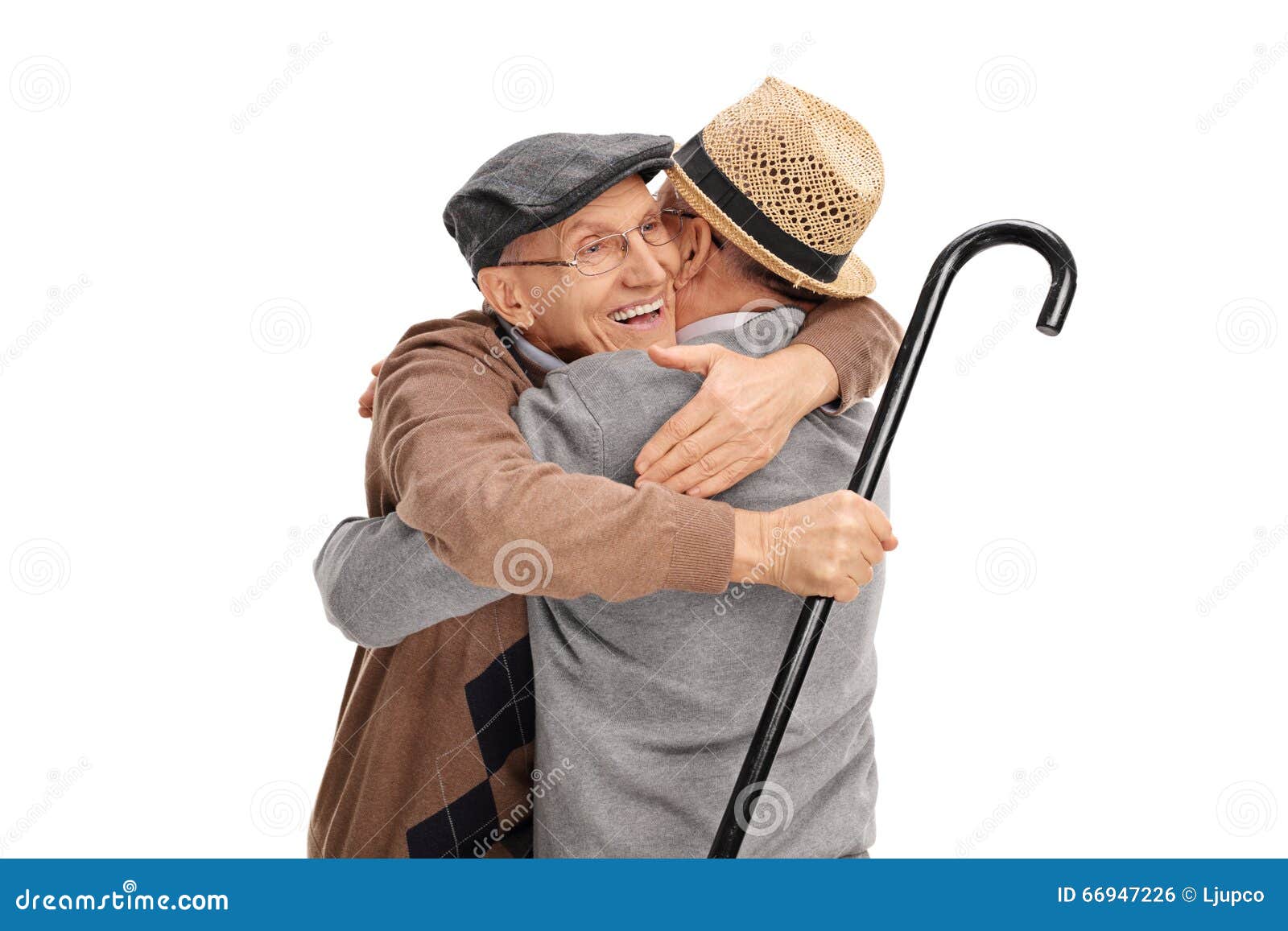 Studio shot of two old friends hugging each other isolated on white background