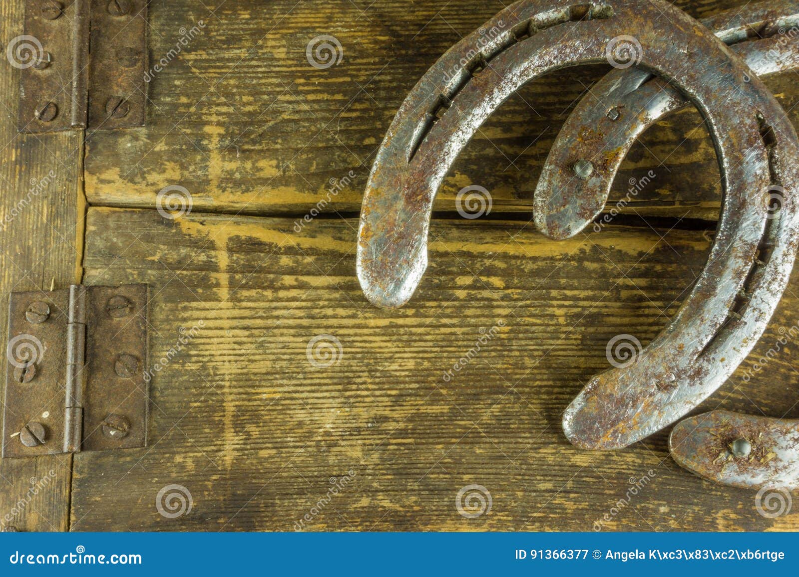 Two Old Horseshoes on a Rustic Wooden Stock Image Image of charm