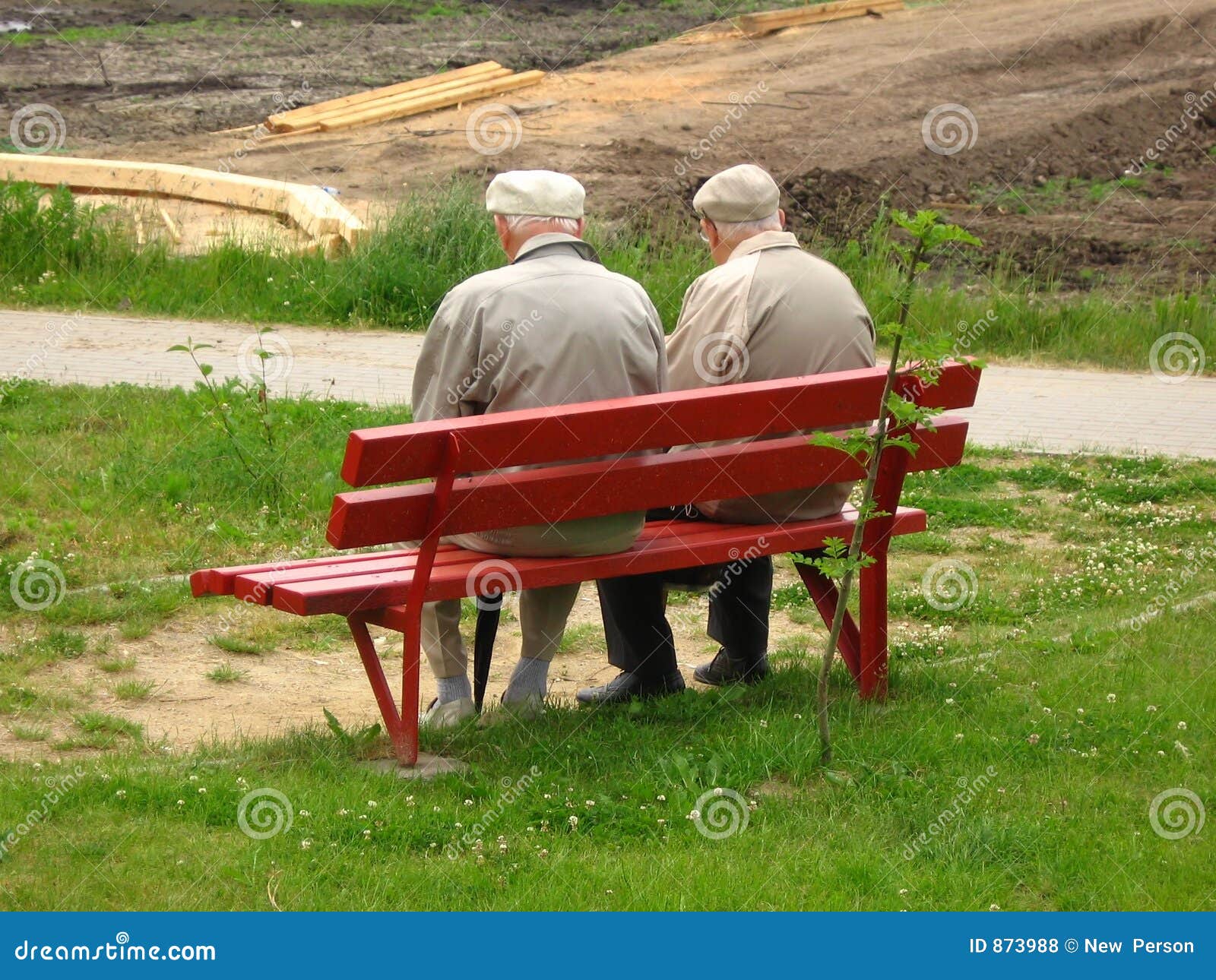 two old man sitting on the bench