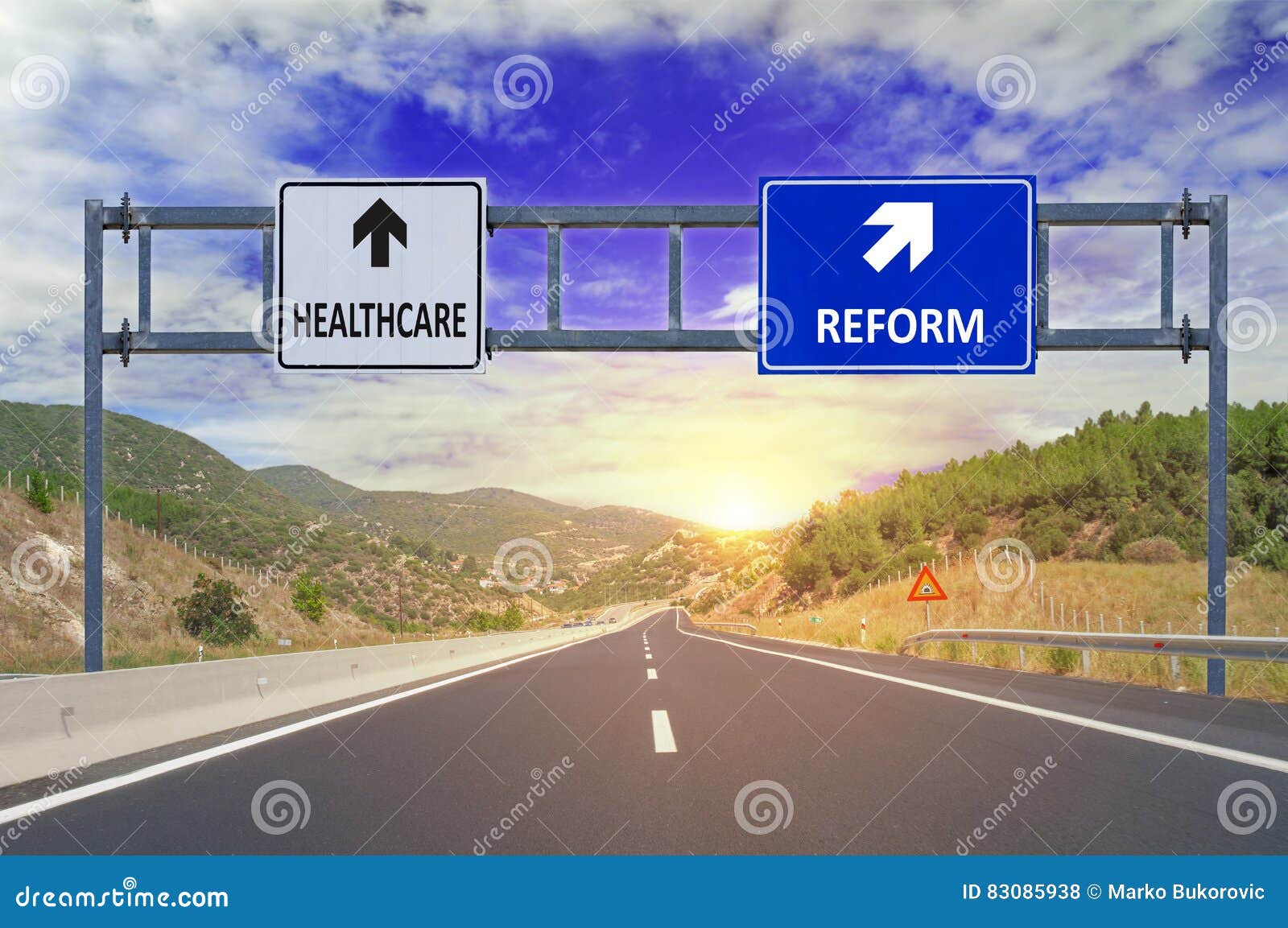 two options healthcare and reform on road signs on highway