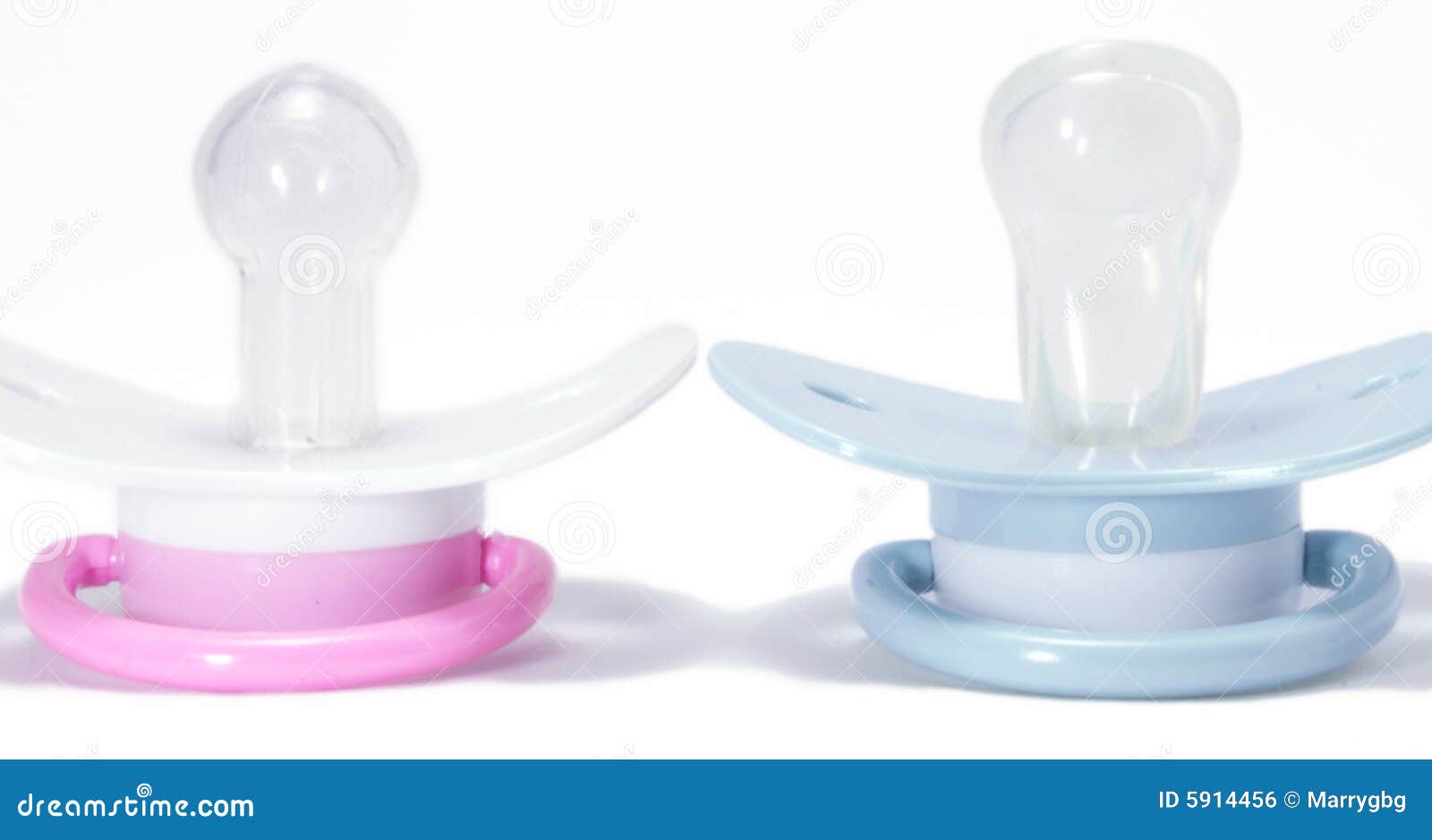 Two Pacifiers on a White Background Stock Photo - Image of exposed ...
