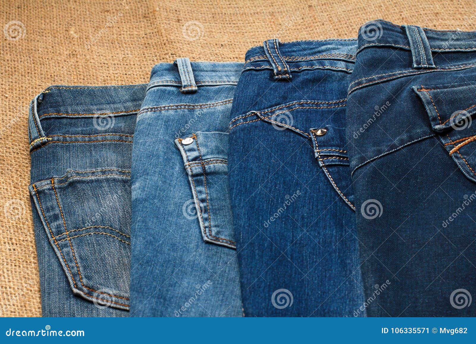 Two Pair of Jeans Lying on Sackcloth Stock Image - Image of style ...