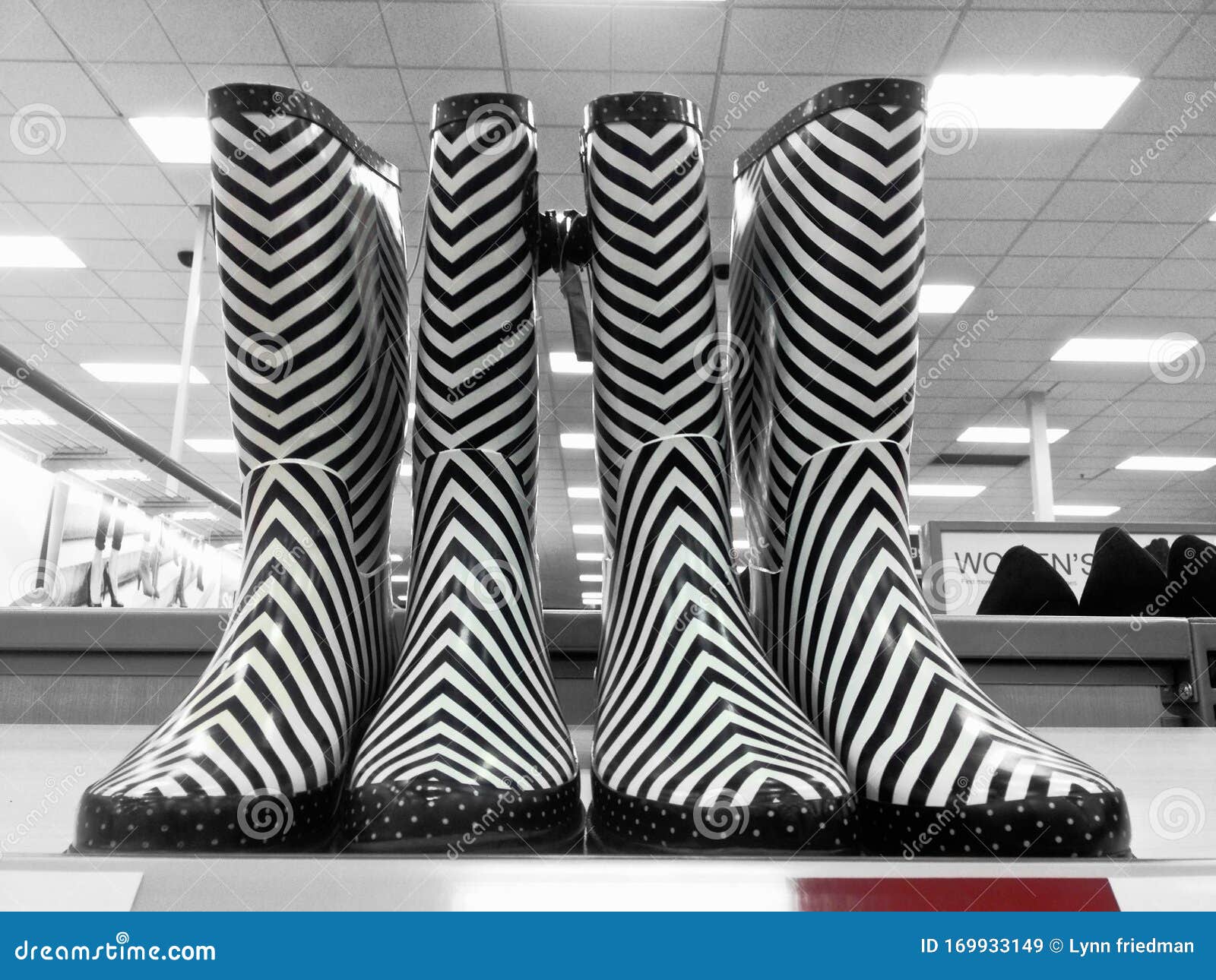 black and white striped rain boots