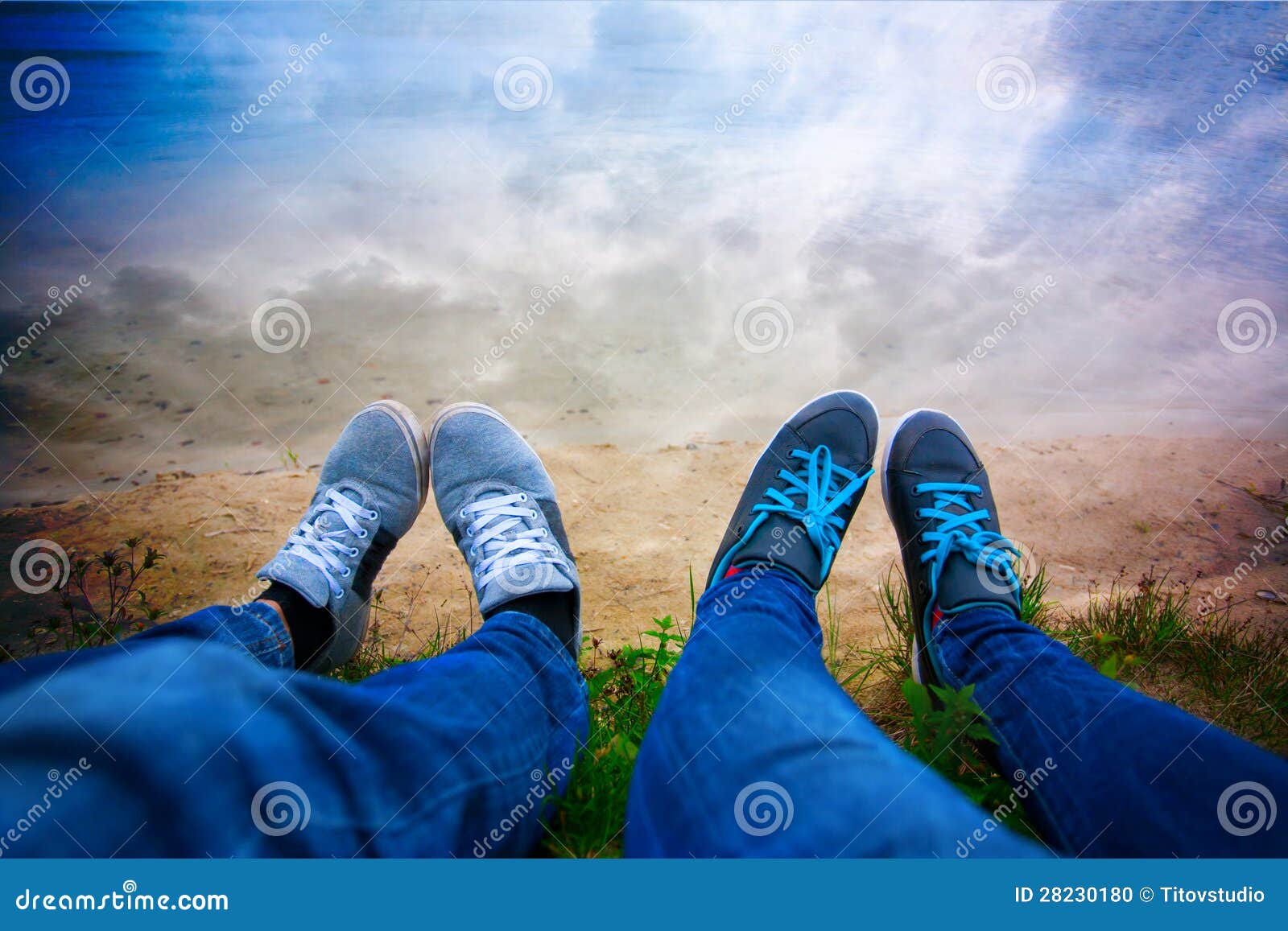 Two Pairs of Legs on the Lake Shore. Sky Stock Photo - Image of beach ...