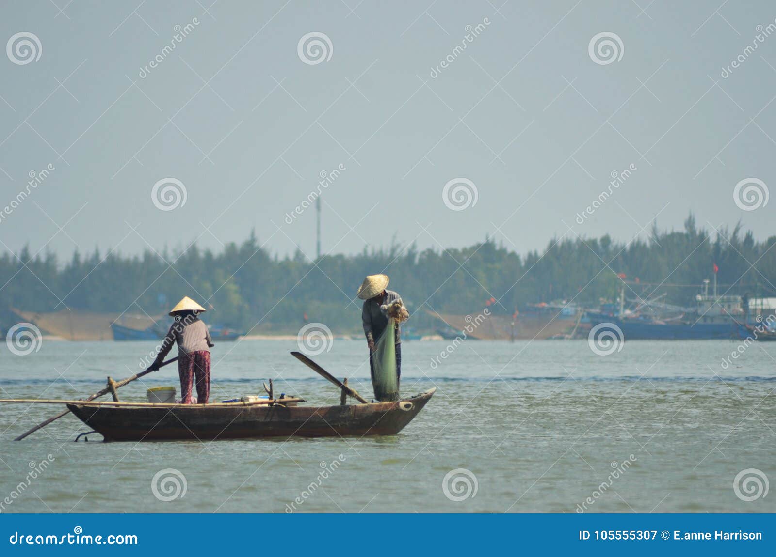 Two People Fishing from a Tradtionalboat in Vietnam. Editorial Photography  - Image of trawlers, background: 105555307