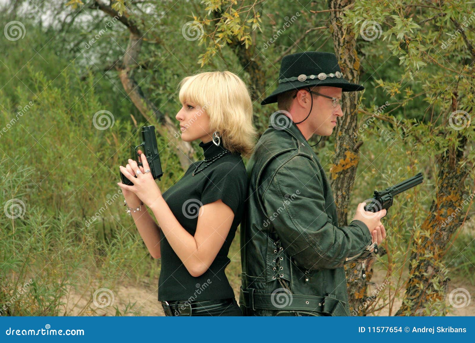 Two people with guns stock photo. Image of crime, elegance 