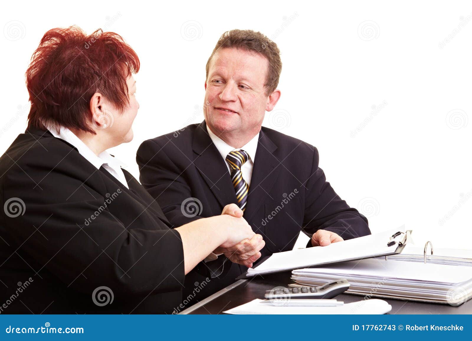 Two people sealing deal stock image. Image of documentation 17762743