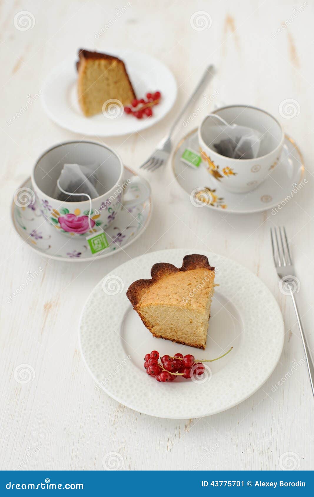 Two Pieces Of Cake With Two Cups Of Tea Stock Image Image Of