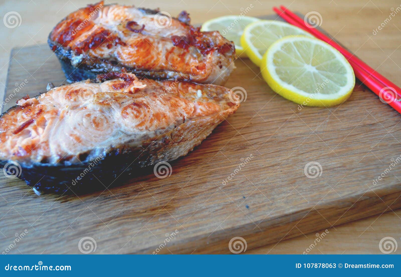 Two Pieces of Fresh Fish with Lemon and Soy Sauce Stock Image Image