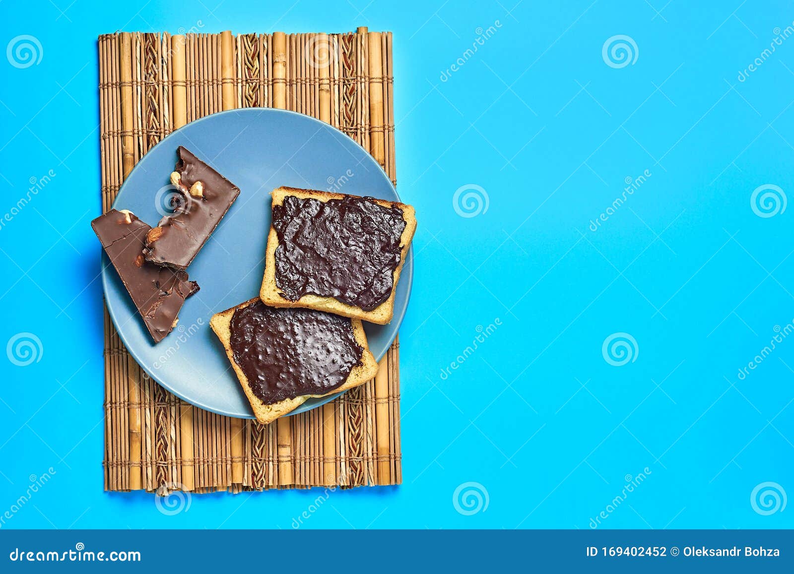 Two Pieces Of Vanilla Bread With Melted Chocolate On Plate And
