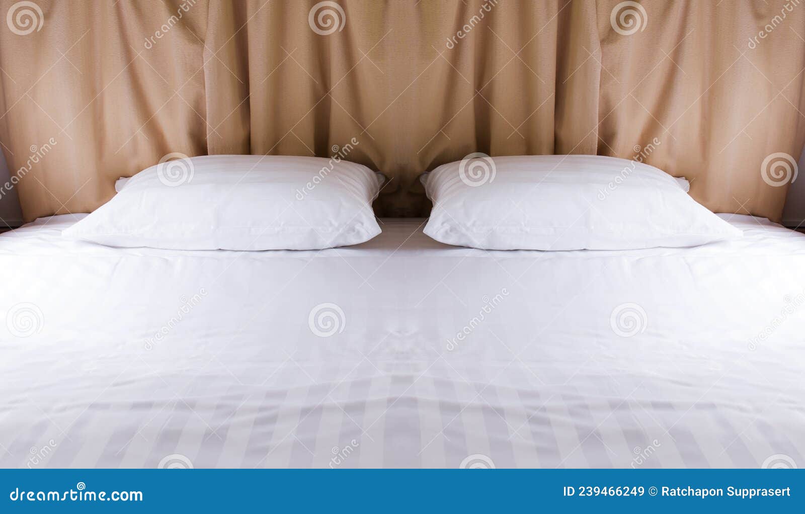 Two pillows on white bed stock image. Image of decoration 239466249