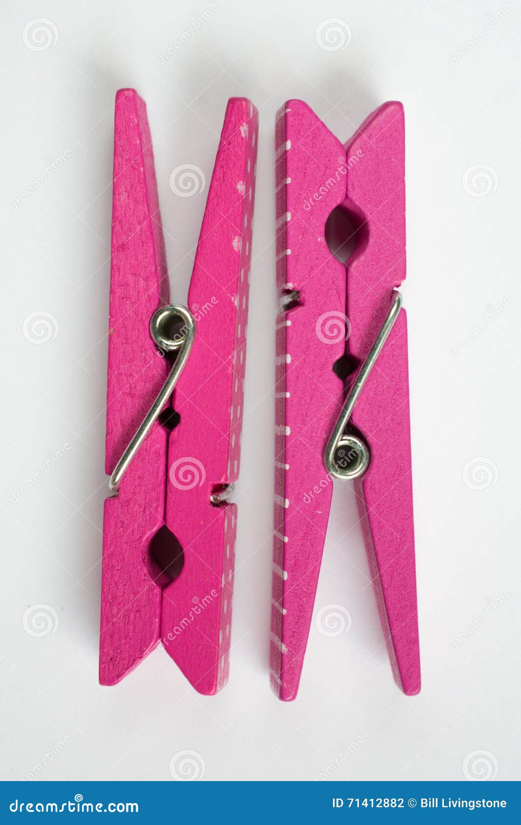 Two Pink Clothes Pins with Fun Patterns Flipped Top View Stock Photo