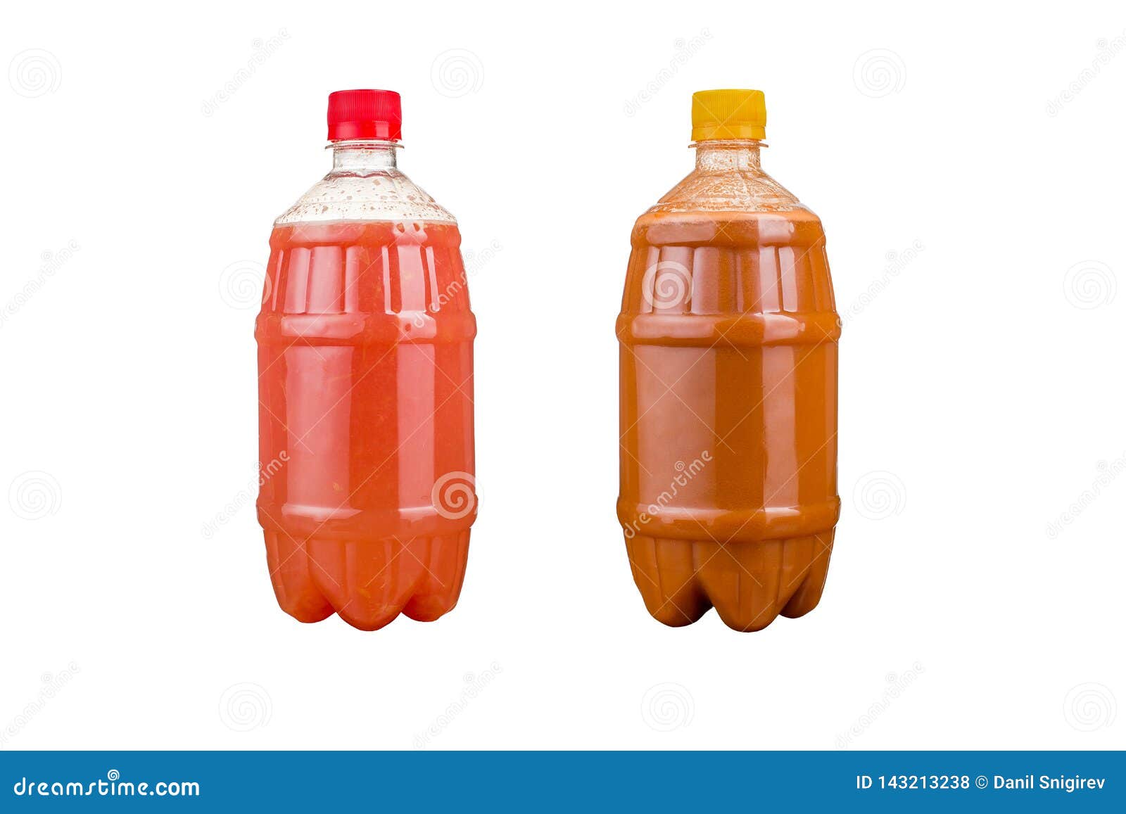 Two Plastic Bottles with Colorful Natural Juices. Isolated Stock Photo