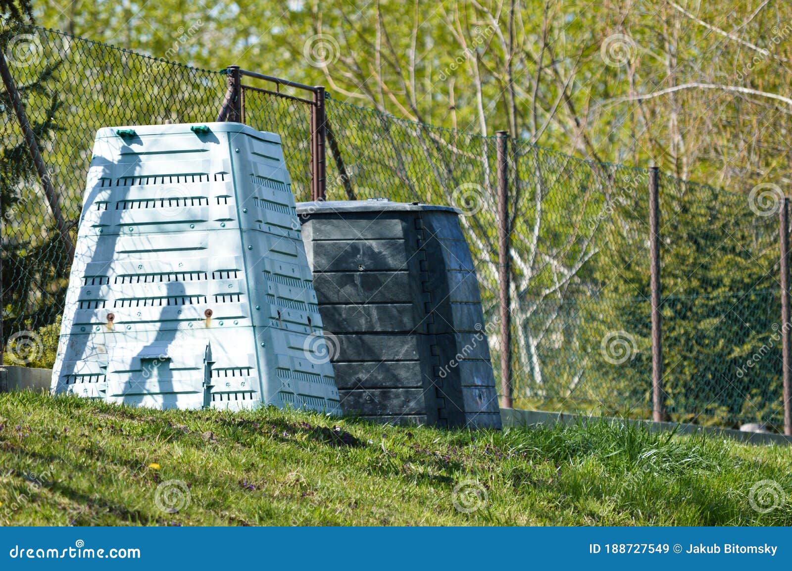 Two plastic composter stock image. Image of family, pile 188727549