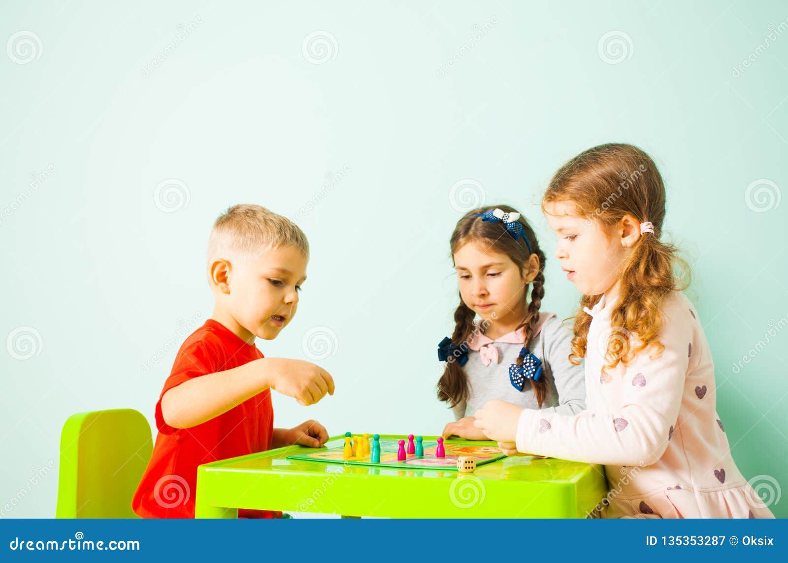 Three Kids Playing Ludo Game At Home Stock Image Image Of Green Game