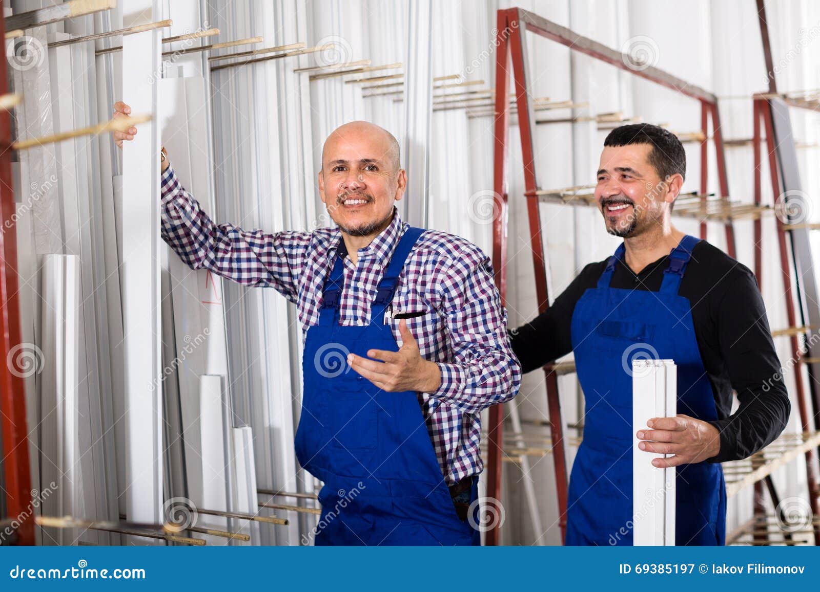 Two PVC Industry Workers in Coveralls Stock Image Image of european